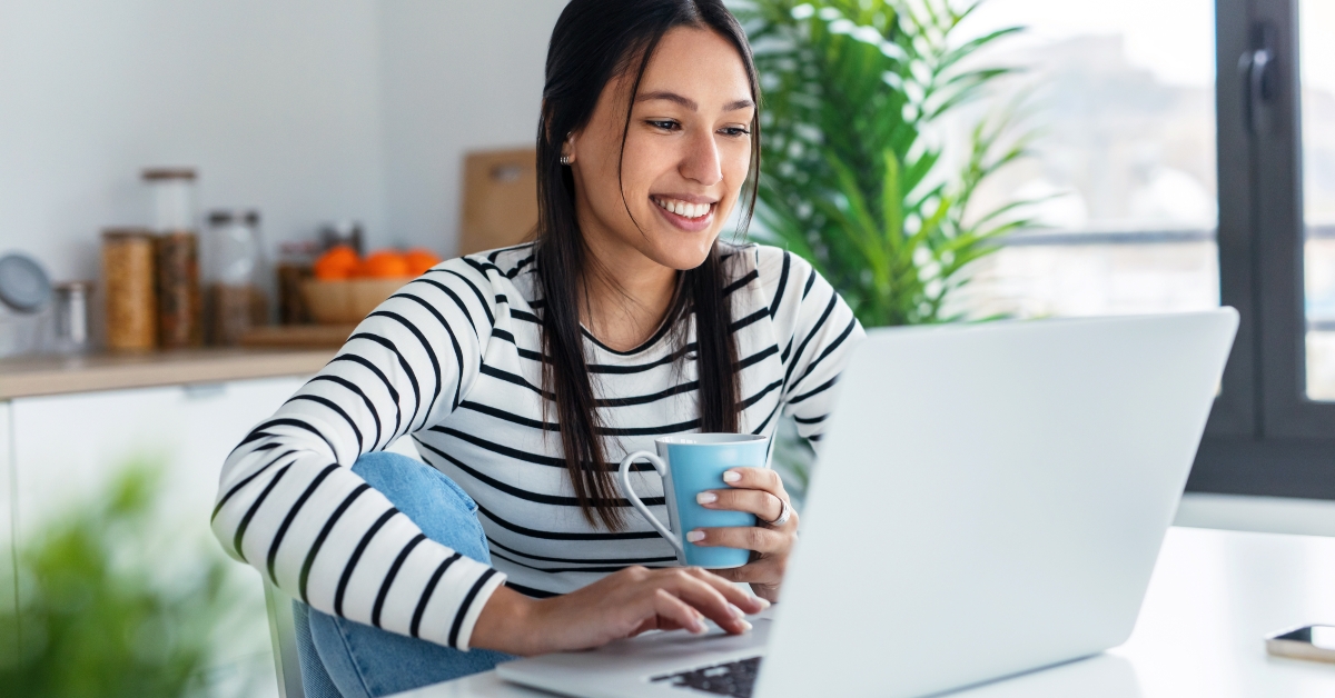 young woman doing video call with laptop