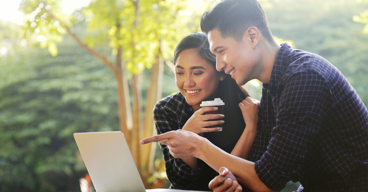couple looking on a laptop