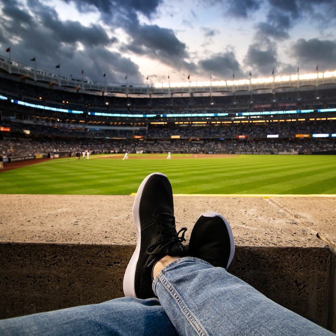 Fan reclining at Yankee stadium
