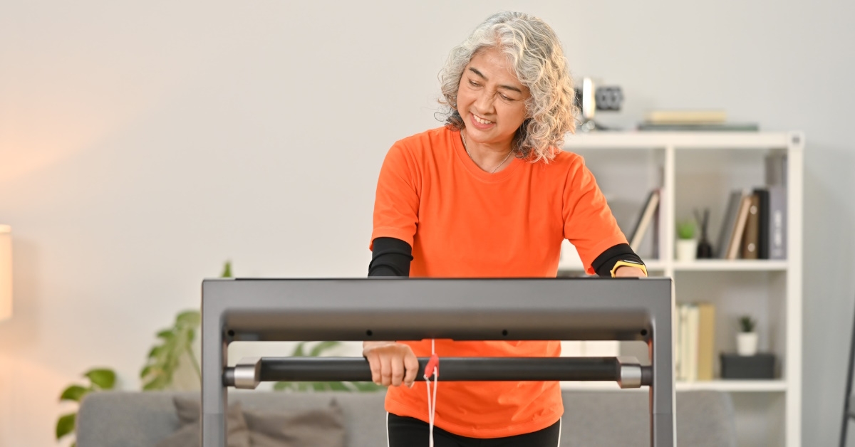 senior woman on treadmill at home