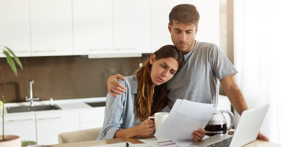 worried couple reading notification