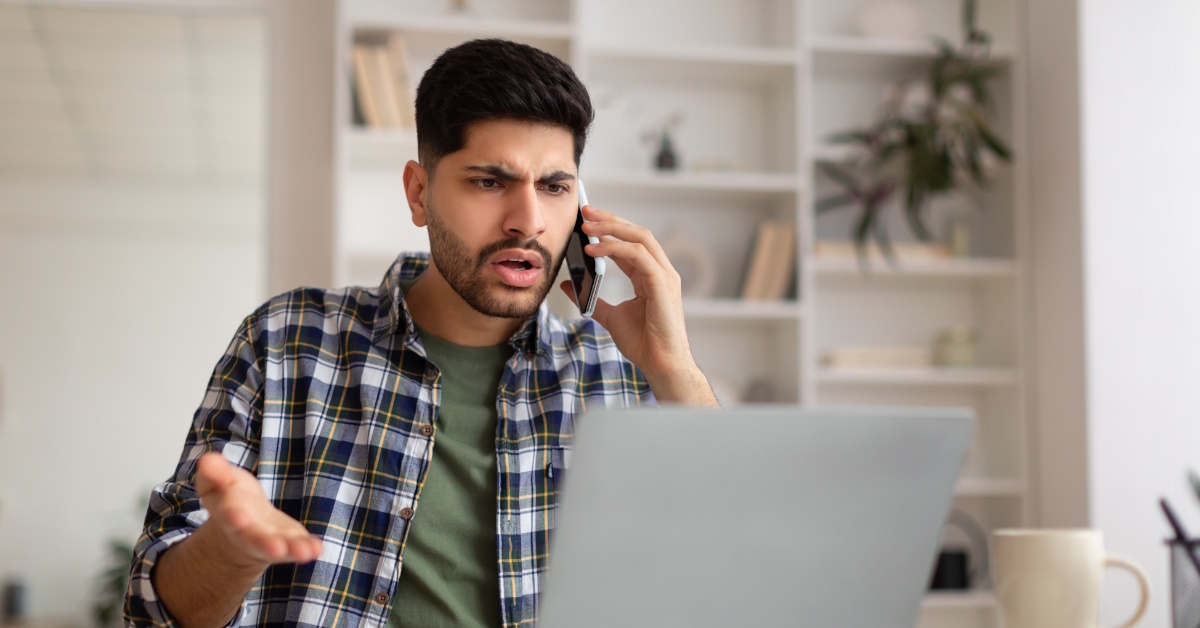 man arguing over call at work