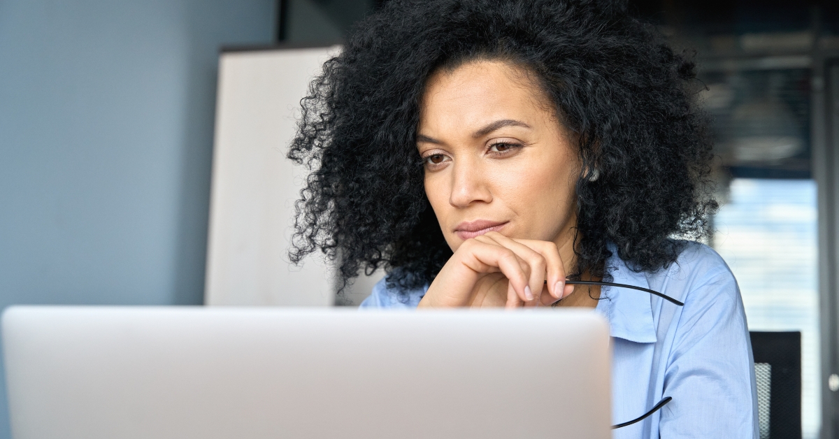 businesswoman looking at laptop