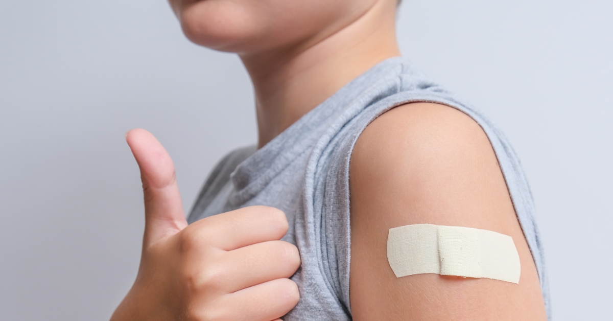 arm of a boy with bandage