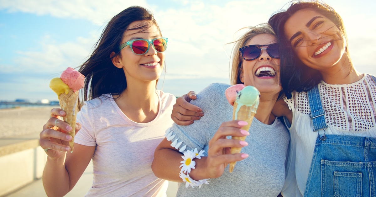 teenage girls enjoying ice cream cones