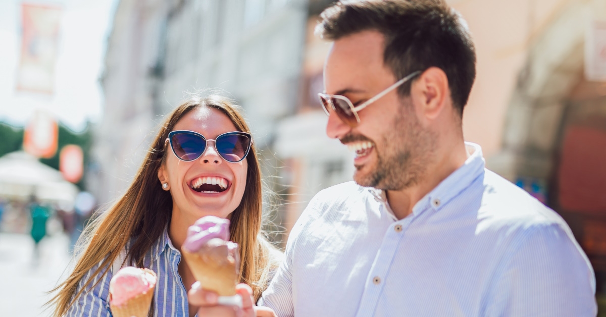 couple savors ice cream during date.