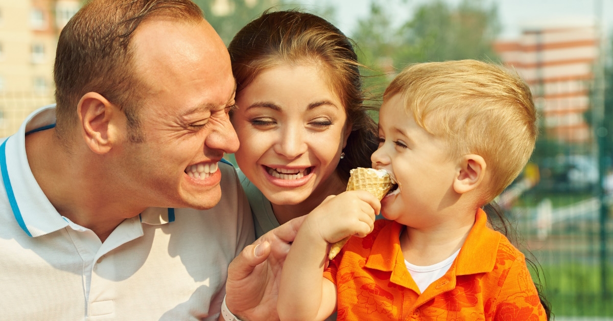 family enjoying eating ice cream.