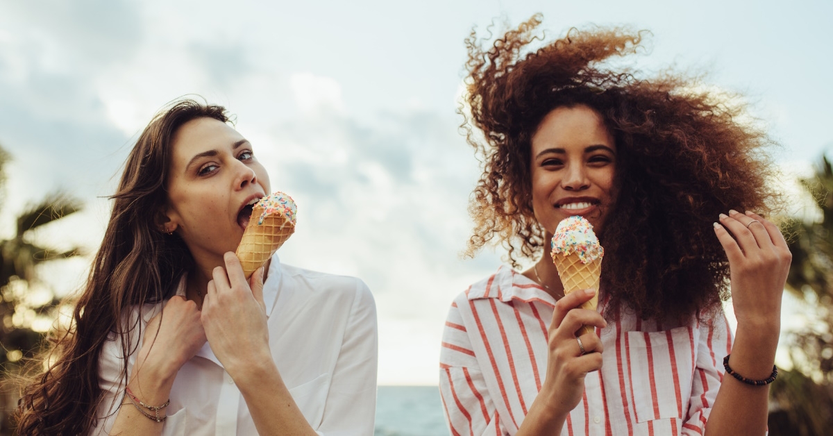 friends enjoying ice cream in open air.
