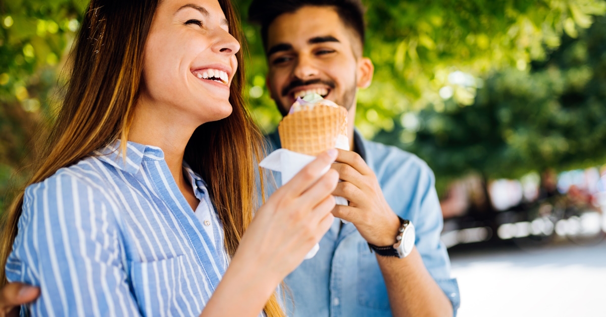 couple eating ice cream on date.