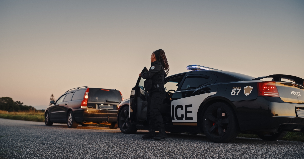 officer stepping out of patrol car
