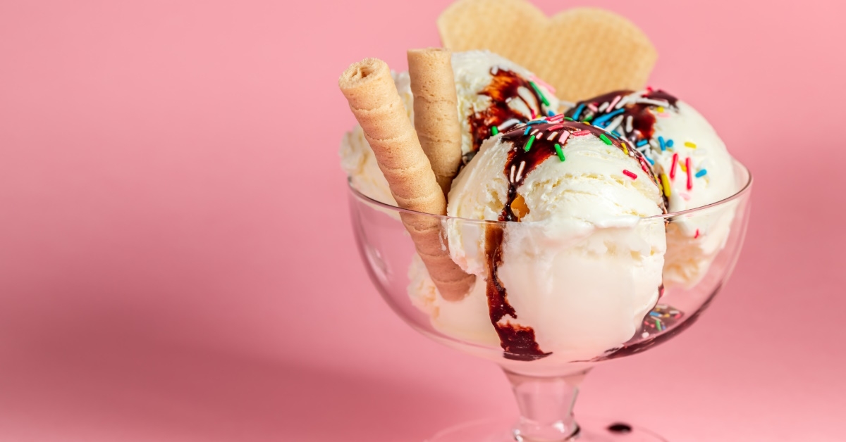 ice cream with chocolate syrup and sprinkles.