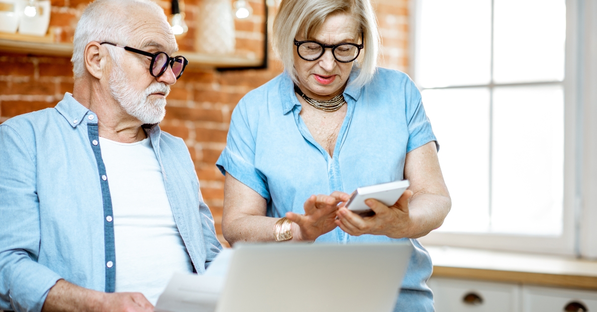 senior couple calculating some bills