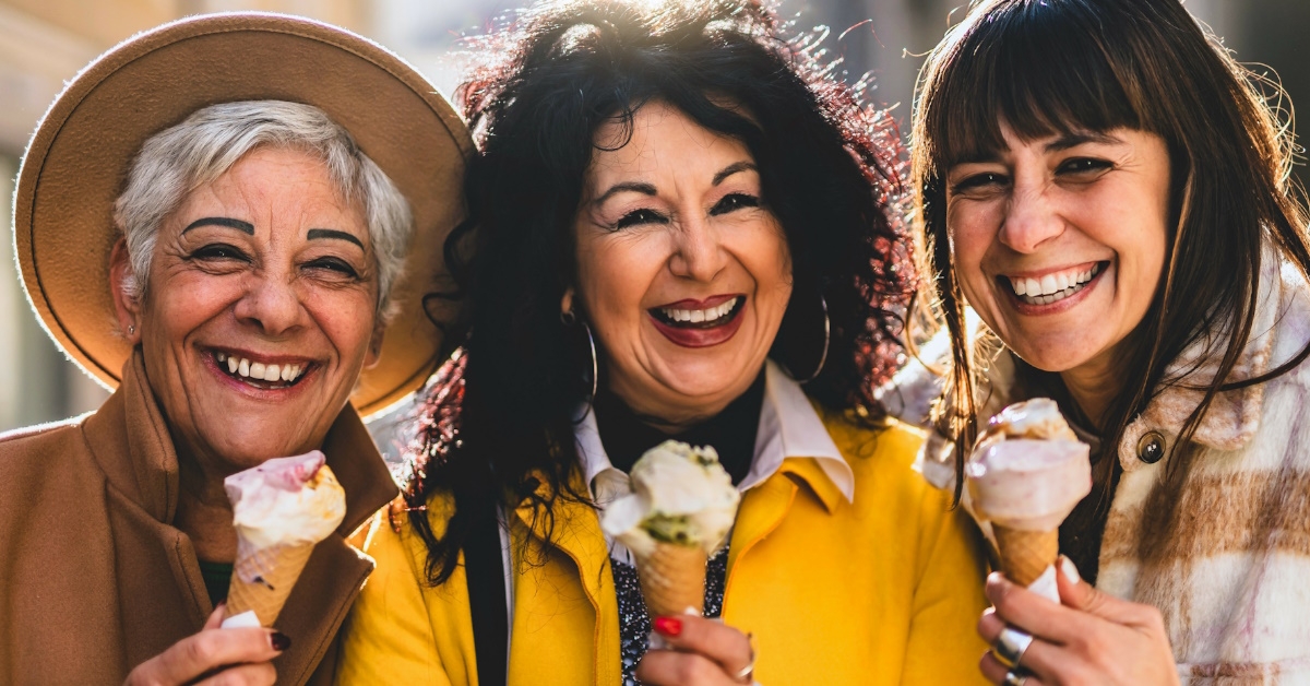 woman of different ages having ice creams