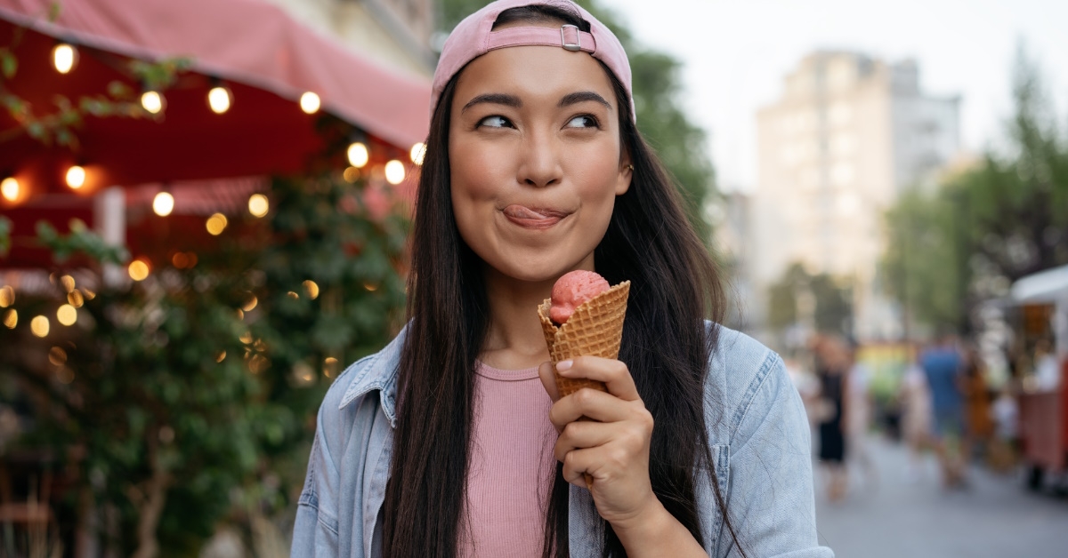 woman eating delicious ice cream
