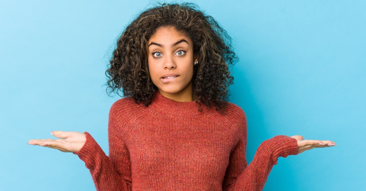 young african american woman acting confuse