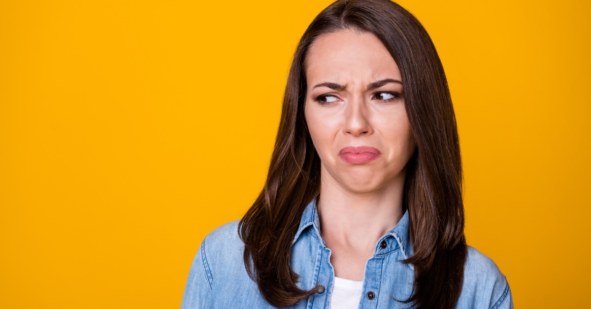young woman with disgusted expressions
