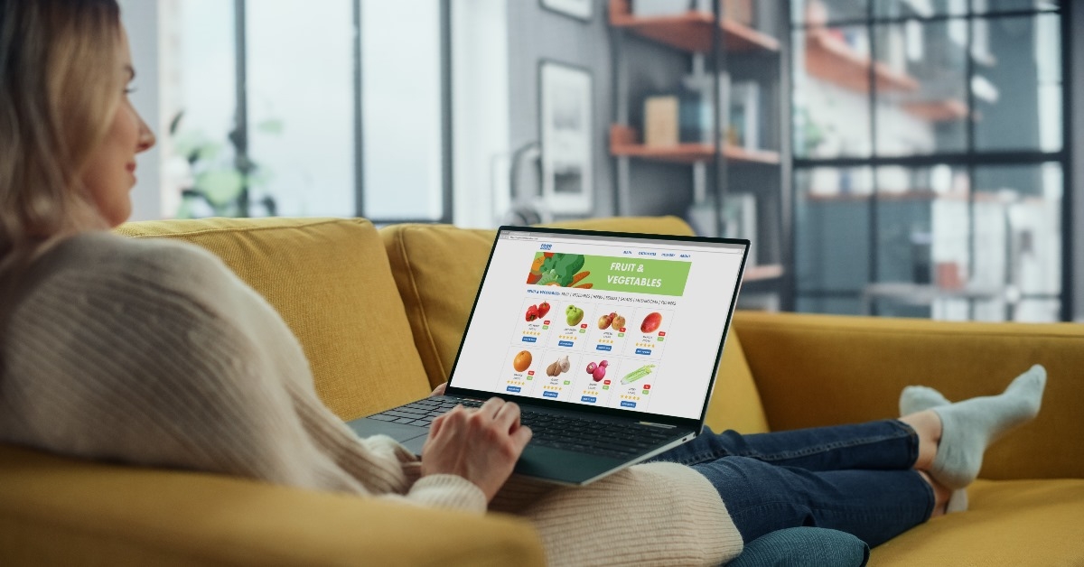 woman placing online order for fresh fruits.