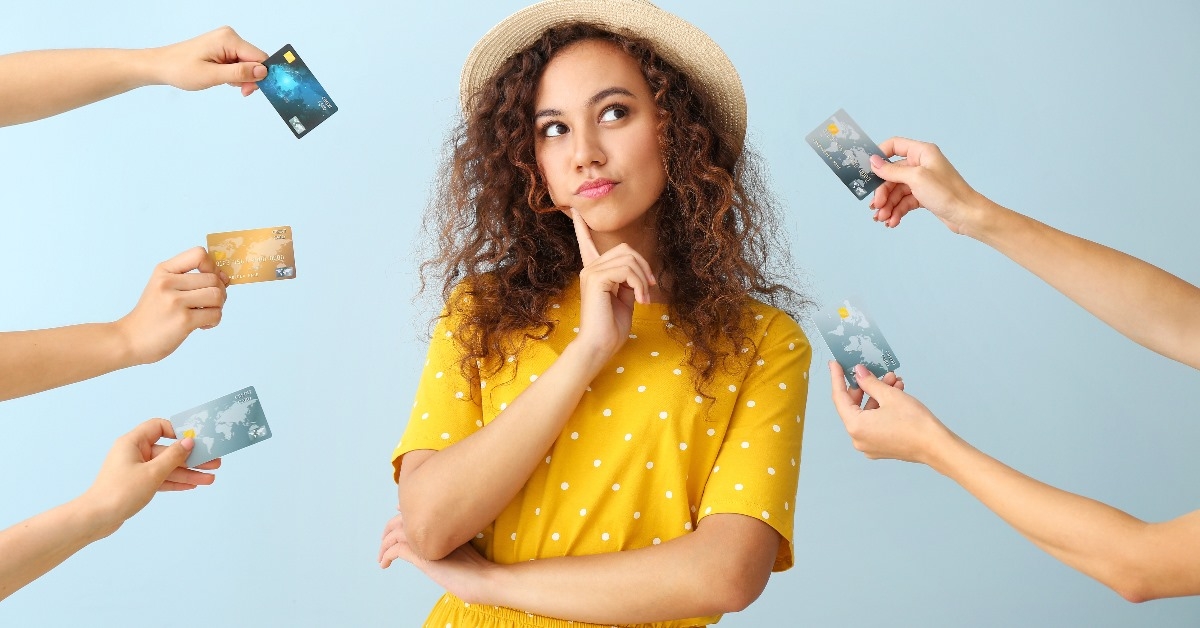 woman confused about selecting credit card.