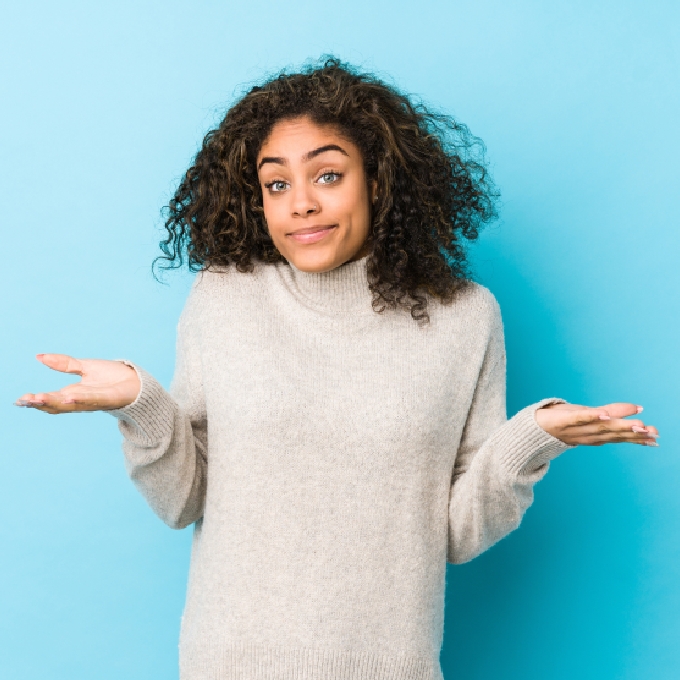 woman shrugging shoulders