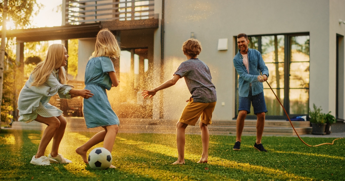 family with garden water hose