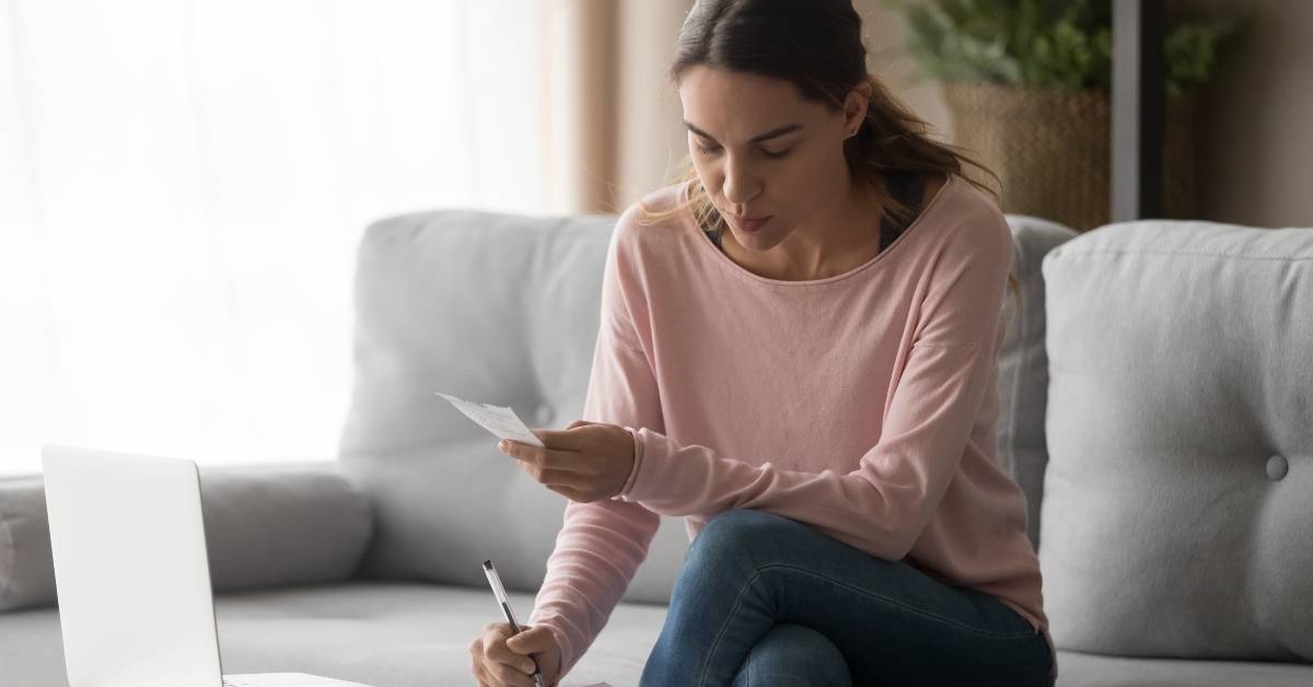 woman calculating domestic bills