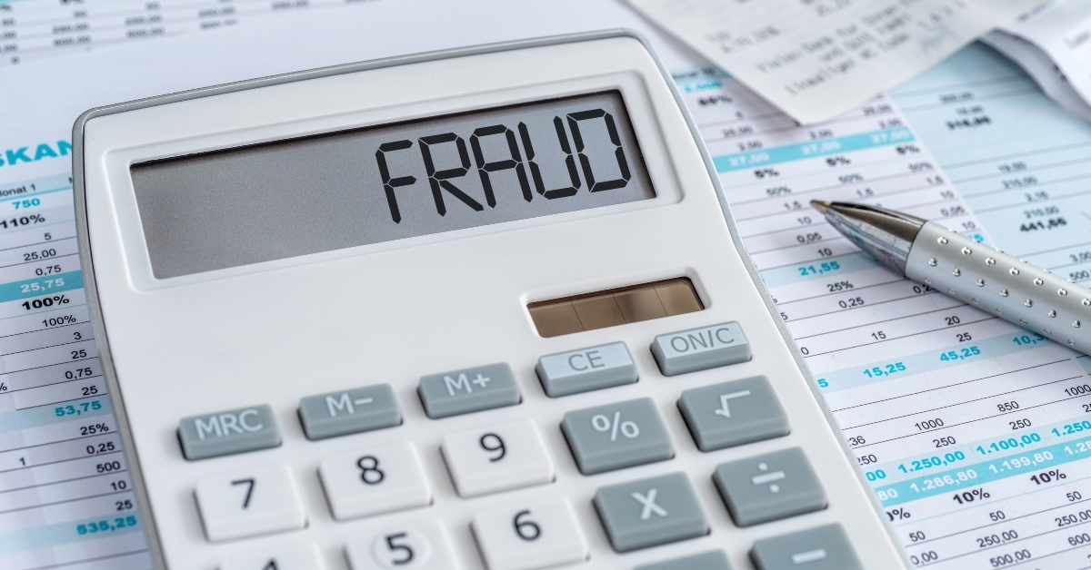 A calculator with fraud on it