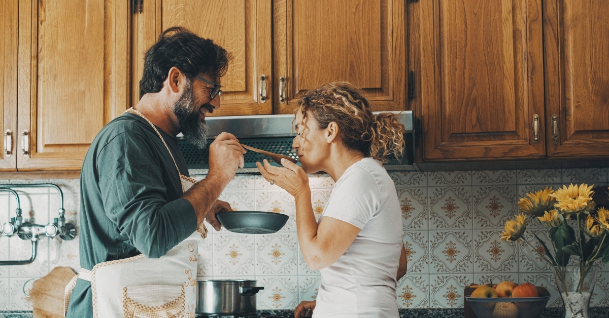Couple making dinner at home