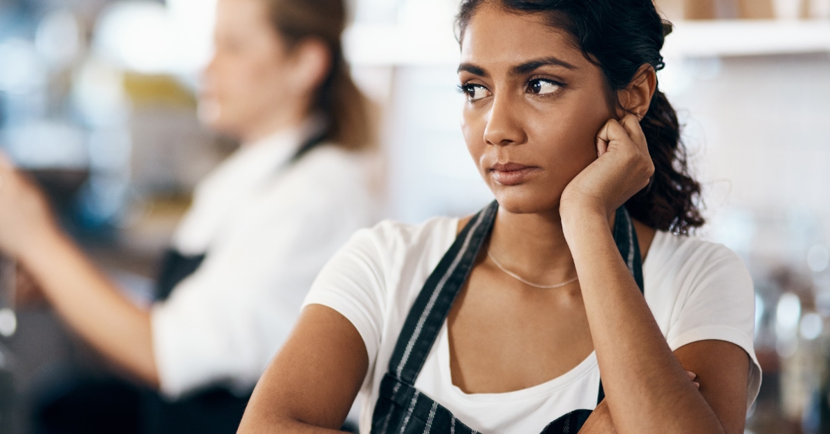 Woman unhappy while working at cafe