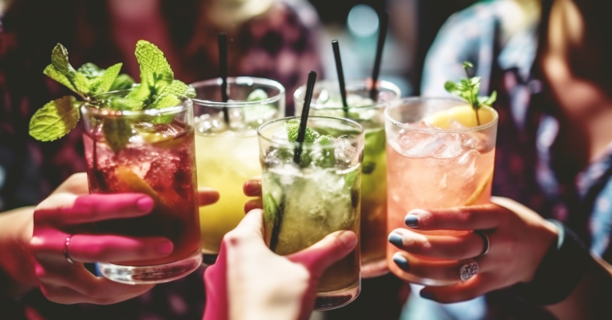 Friends group cheering mojito drinks
