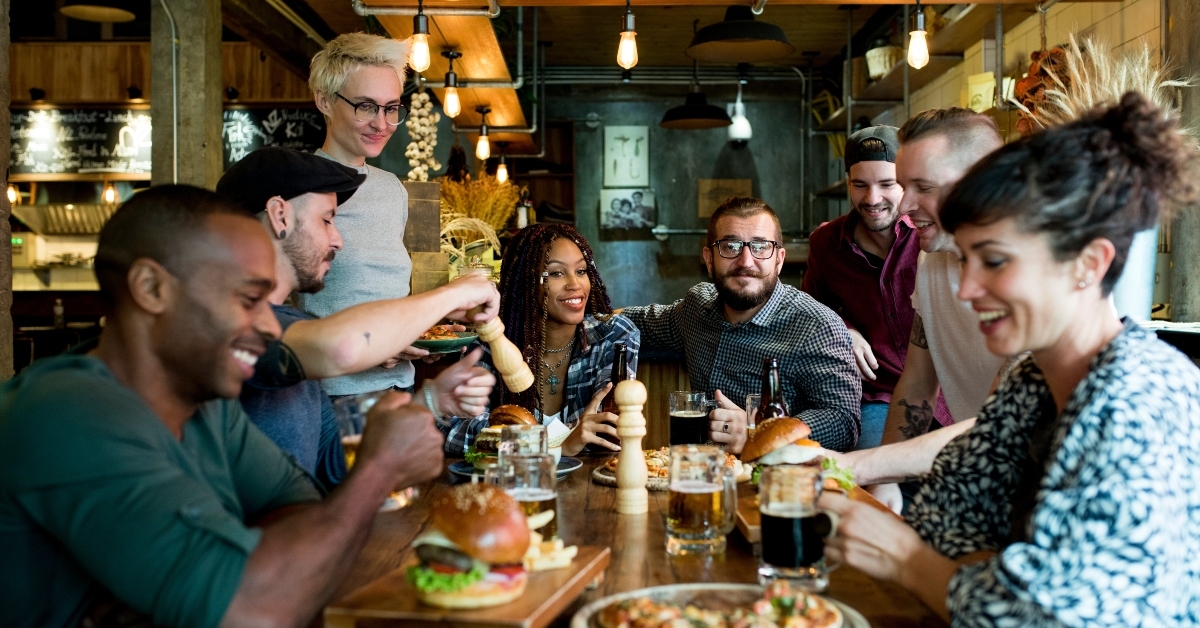 Diverse people hang out pub