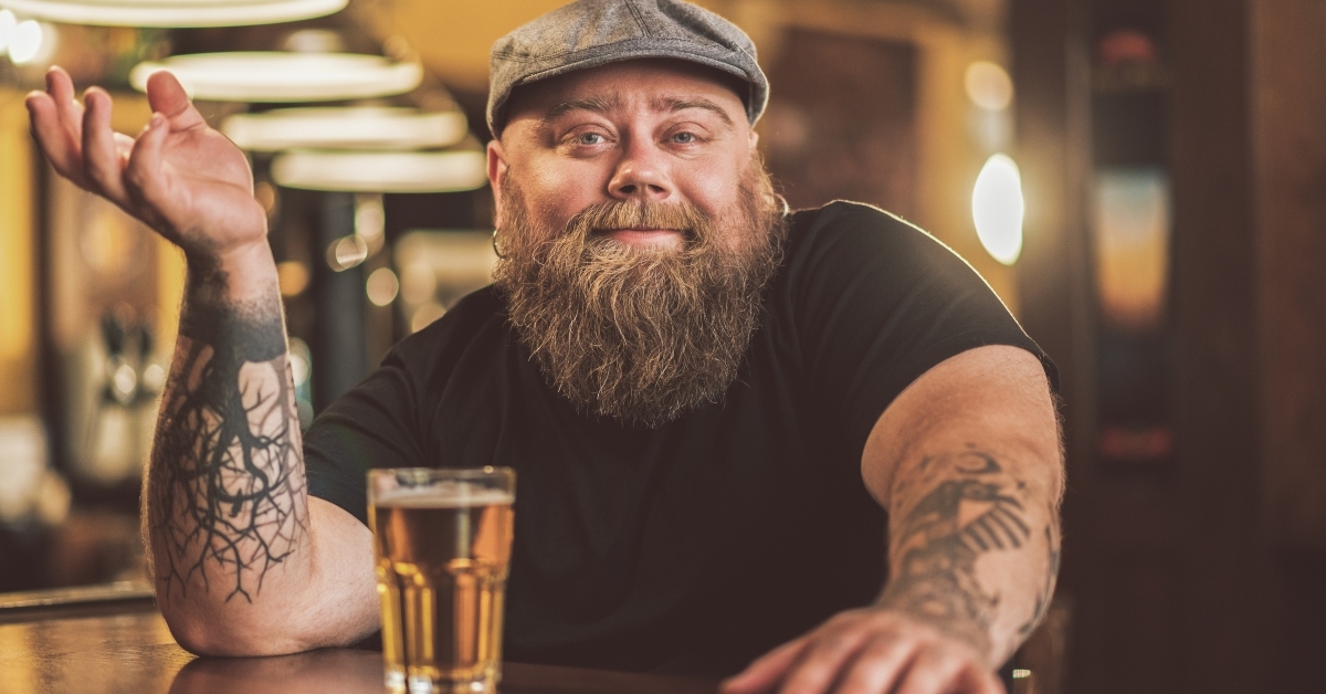 Smiling bearded male
