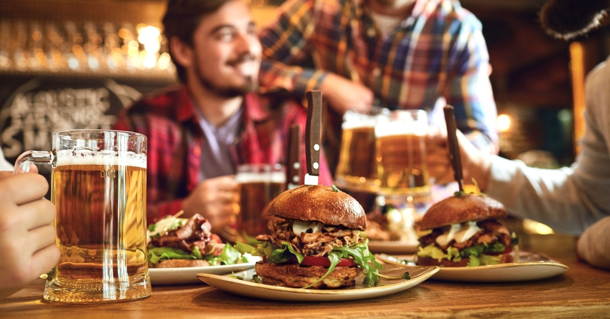 burger with beer on the table