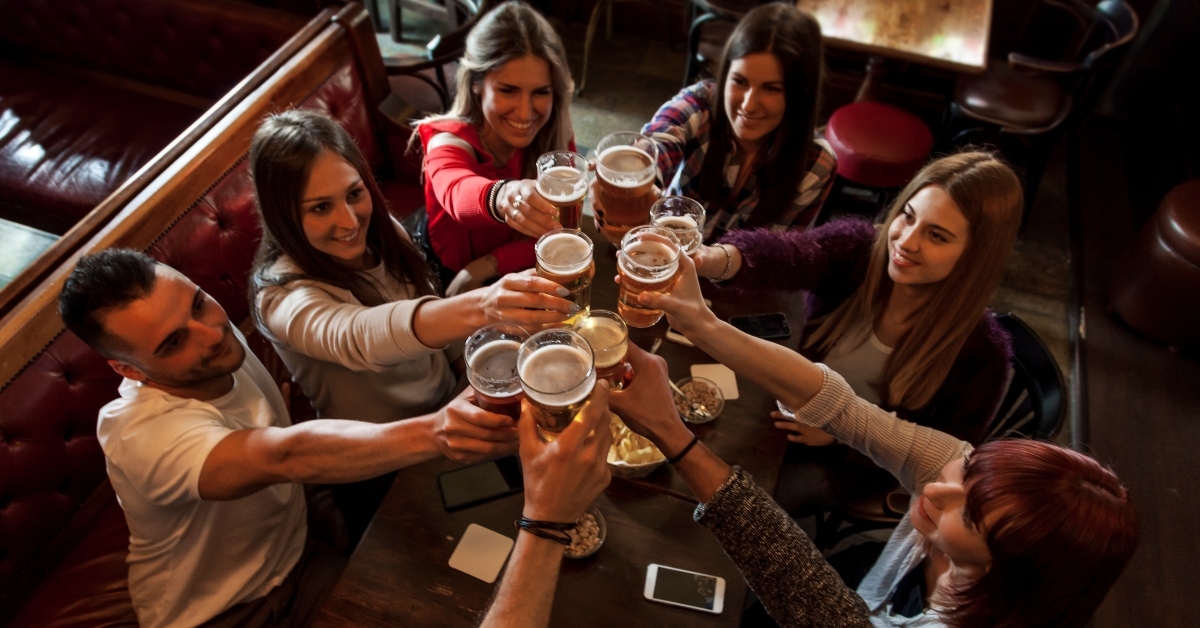 people celebrating in a pub