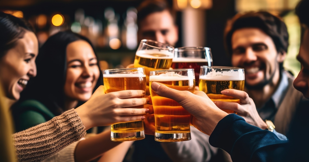 people cheering and drinking beer