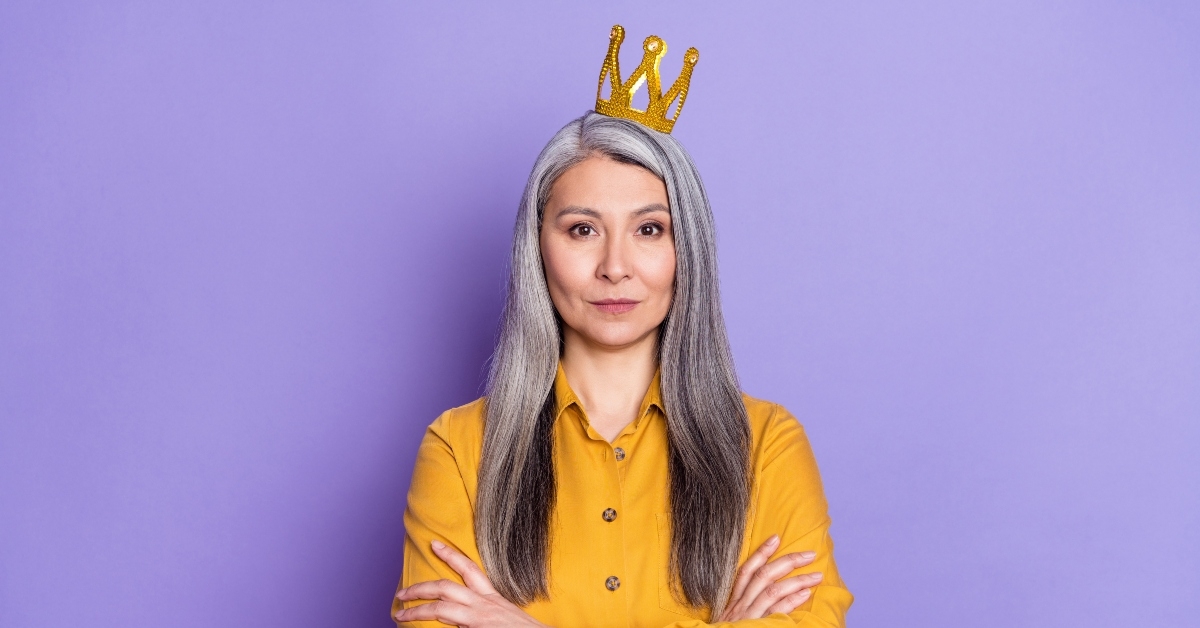Senior woman wearing crown