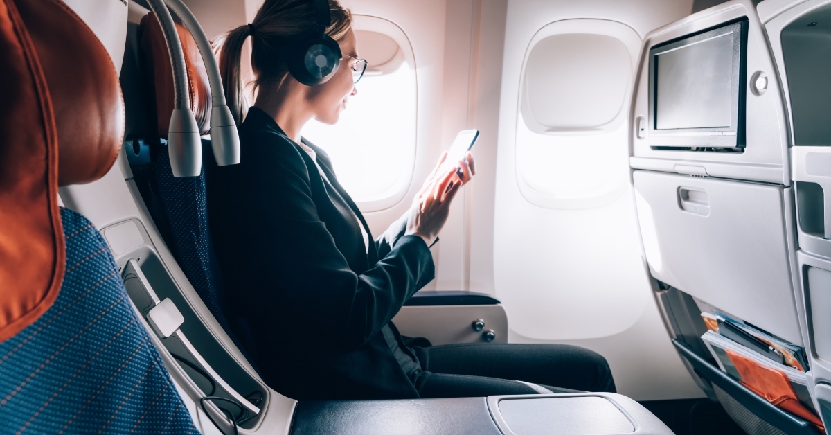 Airline passenger reading email