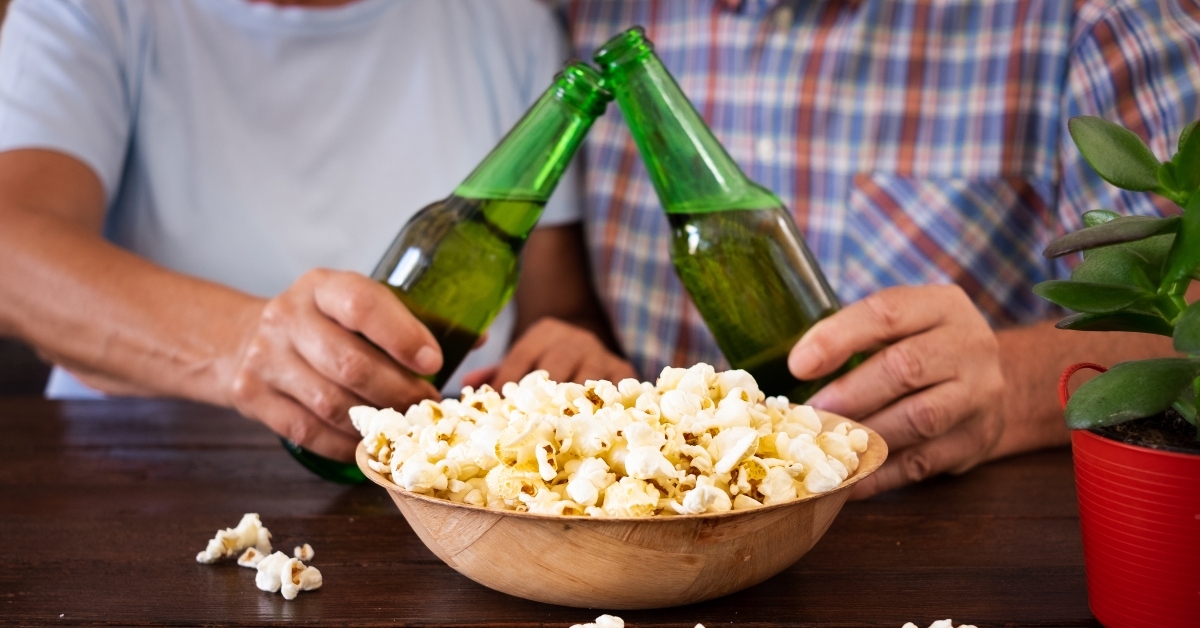 Beers cheers with popcorn