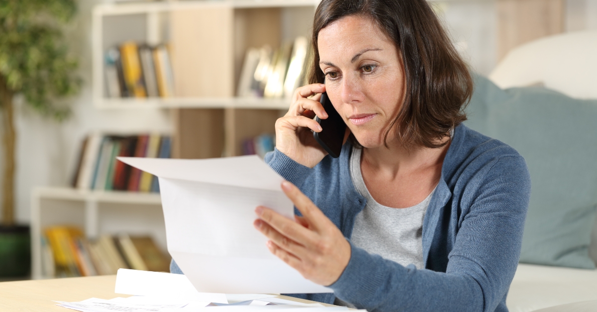 Woman calling on phone at home