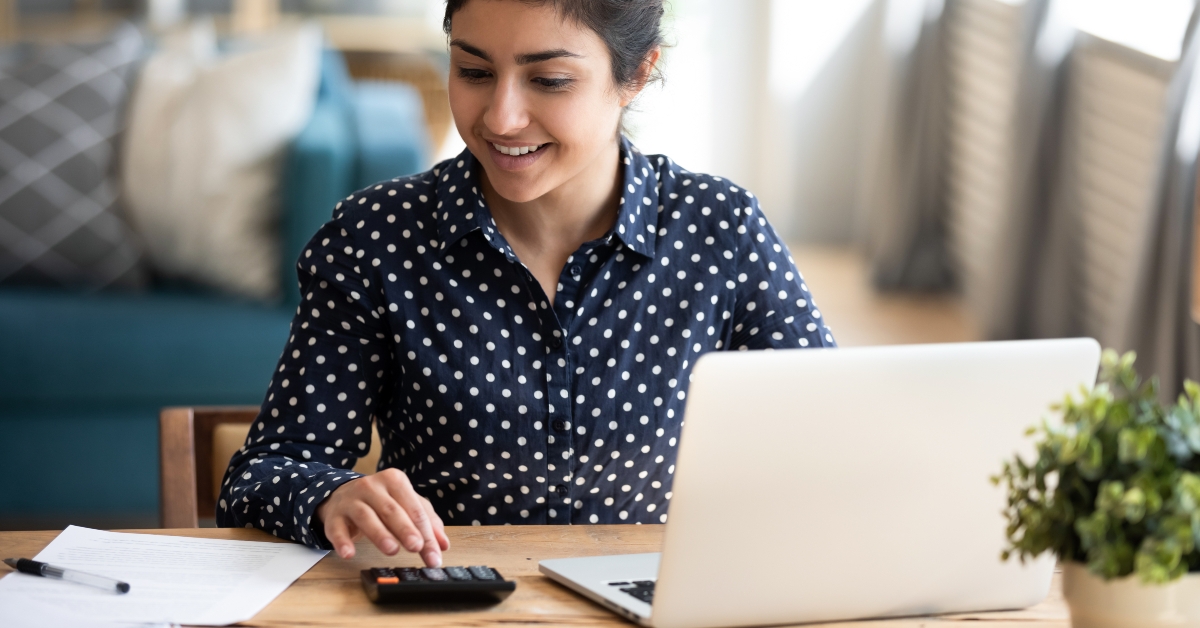 woman paying bills on laptop