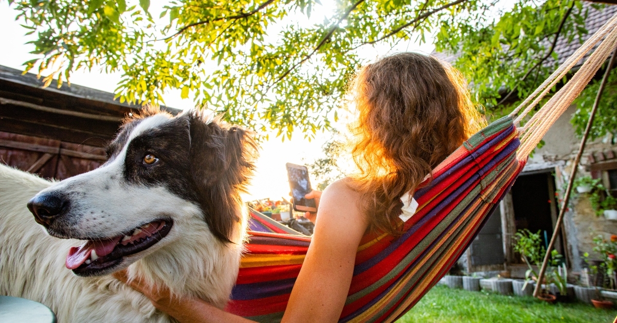 woman relaxing in hammock