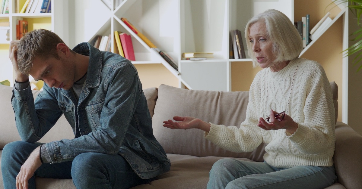 angry mother talking furiously to son