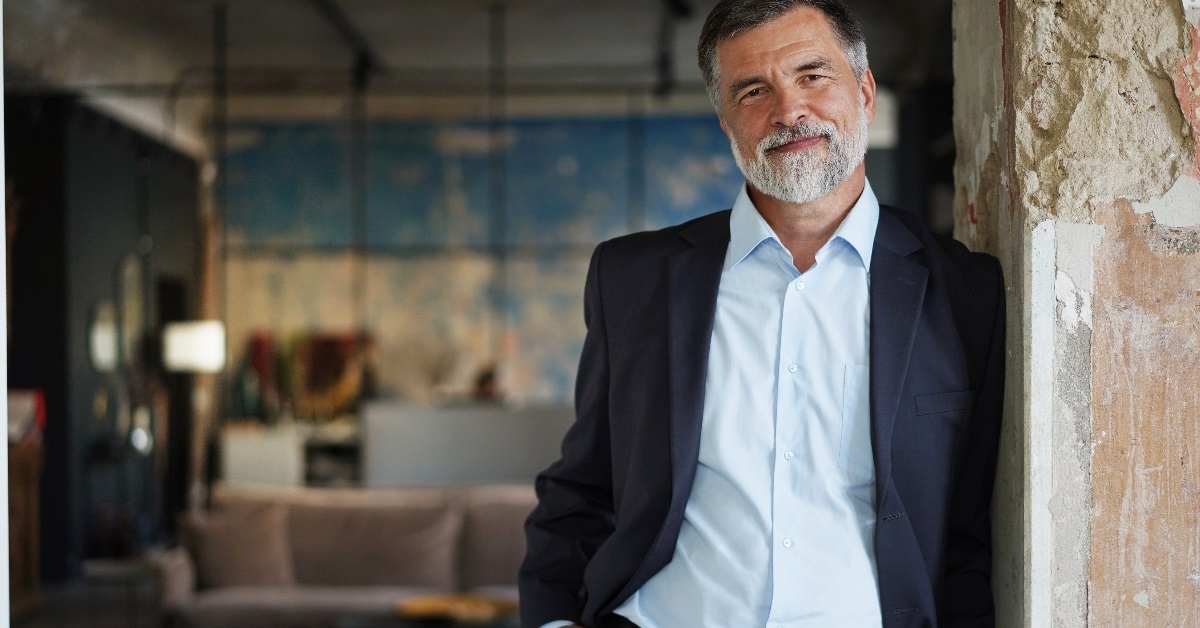 confident businessman in suit in office