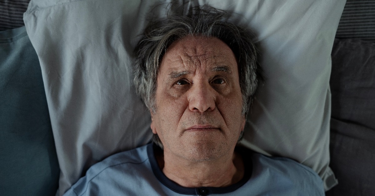 senior man awake late at night 