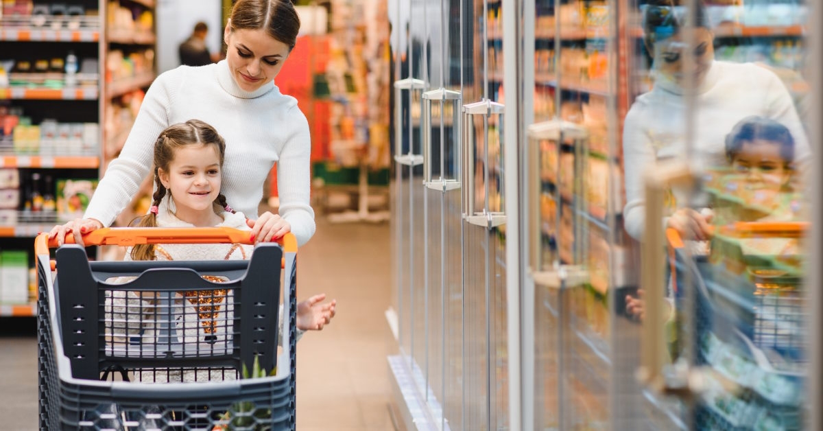 Mother and daughter at grocery store