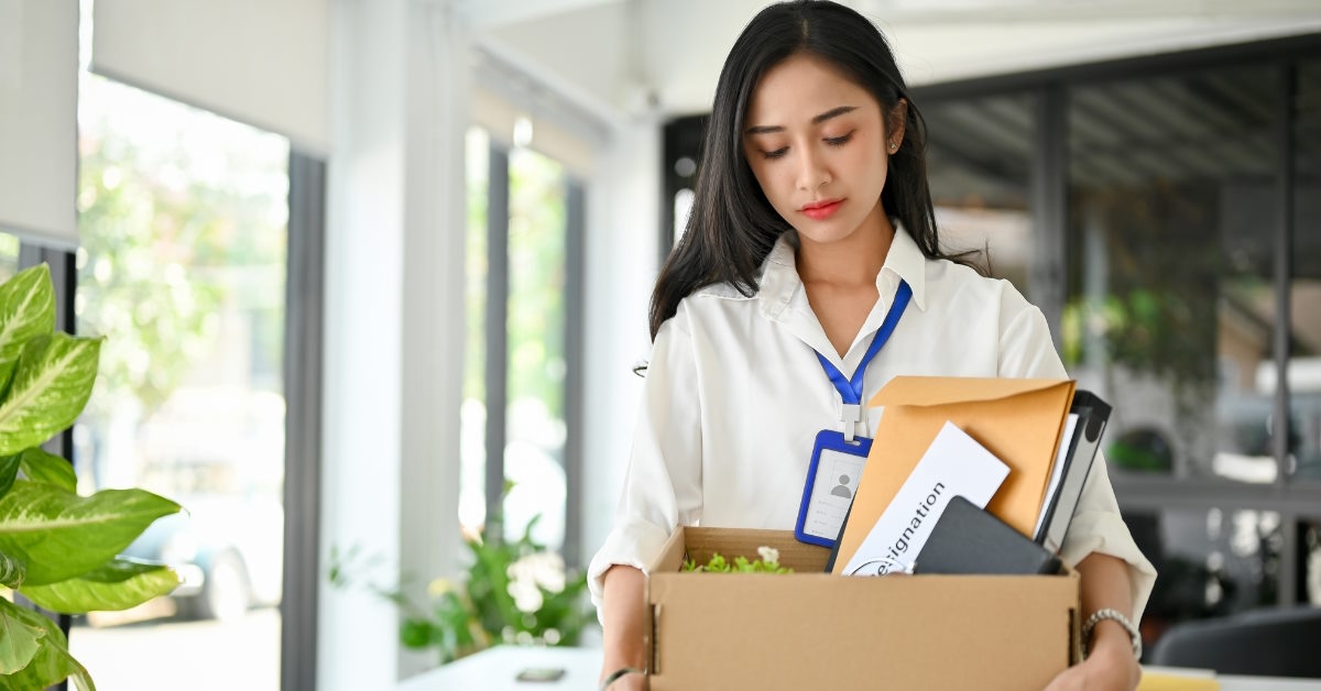 Sad woman leaving office