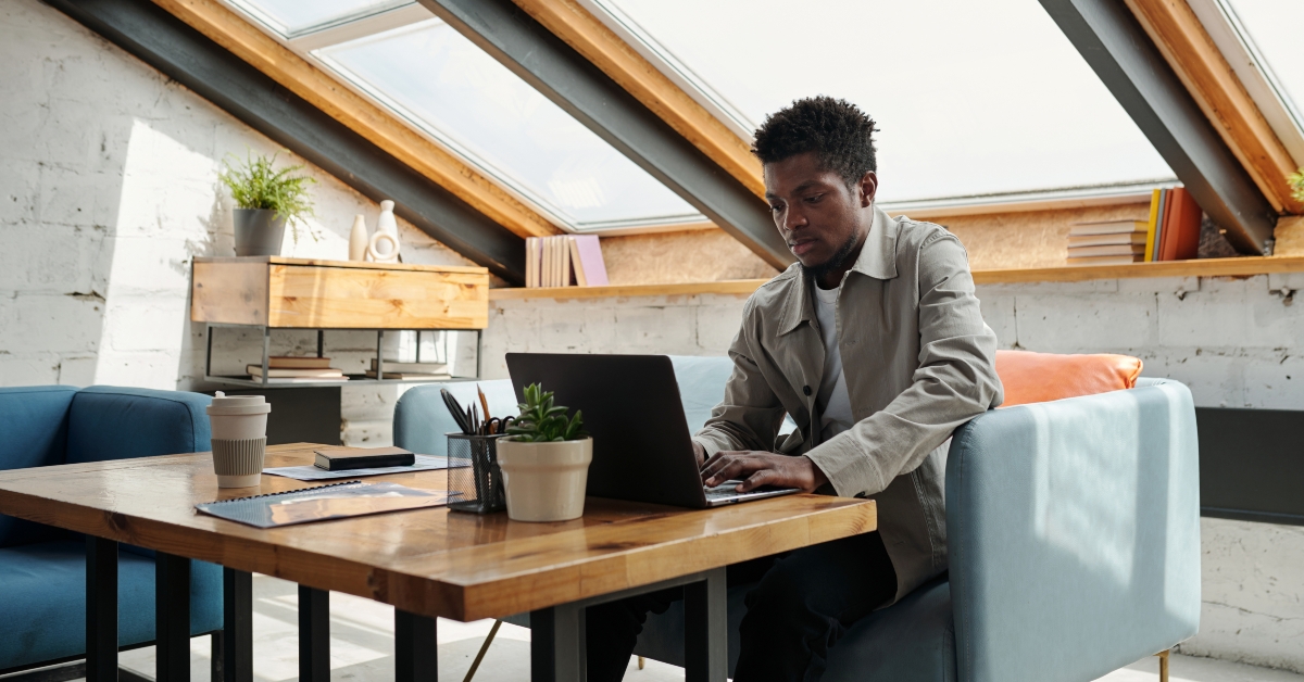 businessman looking at laptop screen