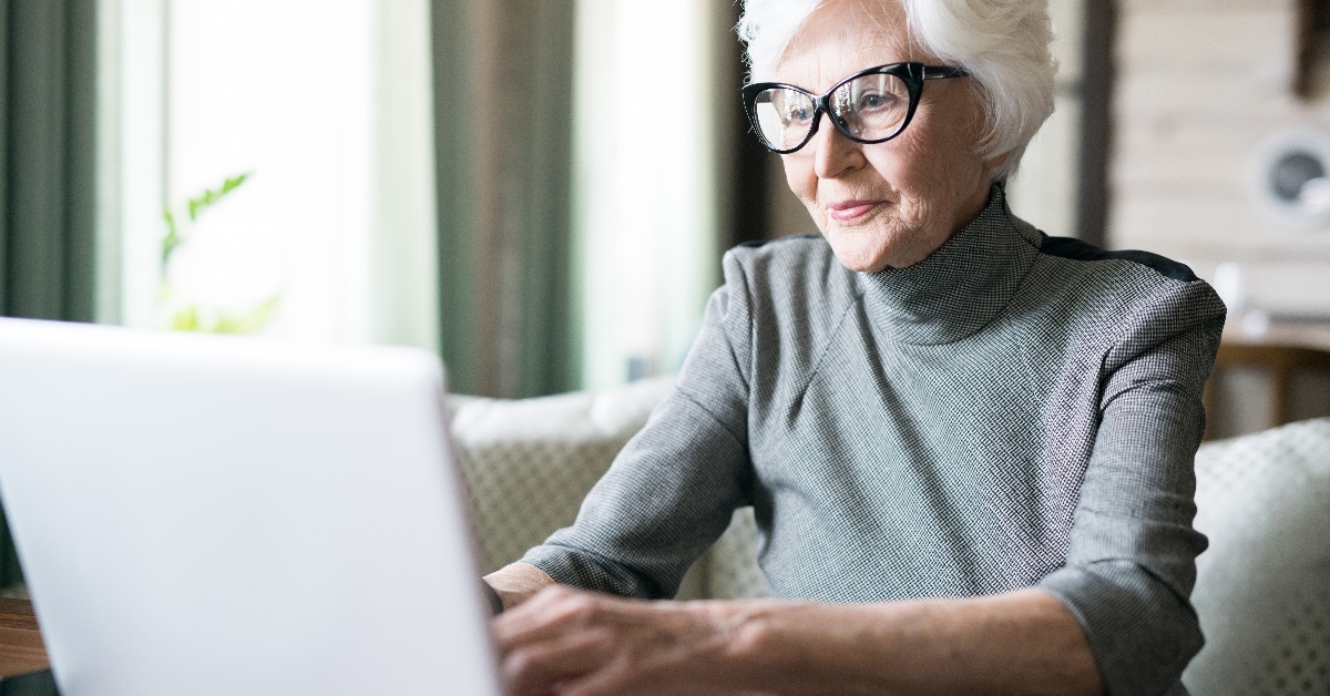 senior woman using her laptop