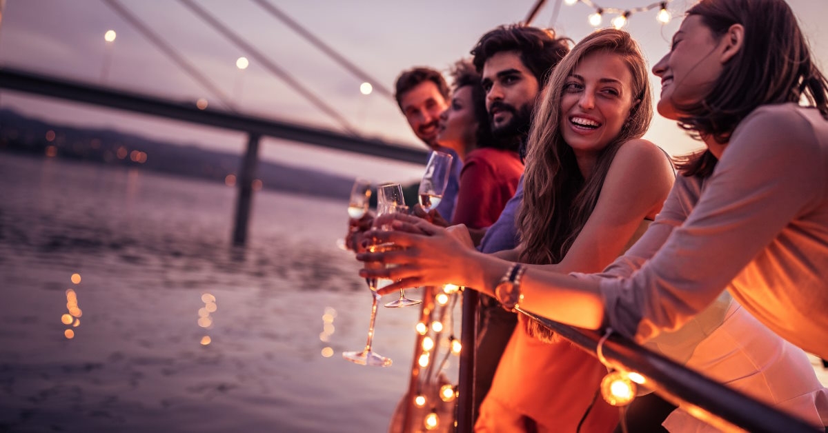 Group of friends enjoying sunset together