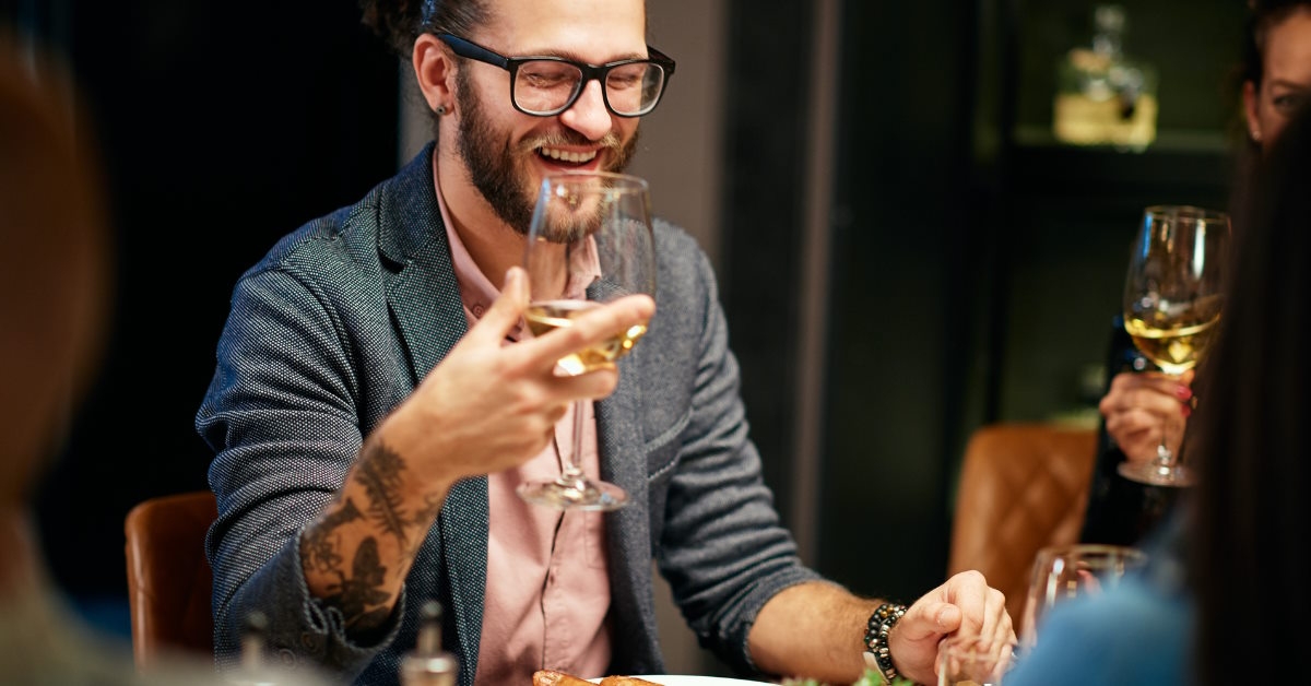 Man holding glass of wine