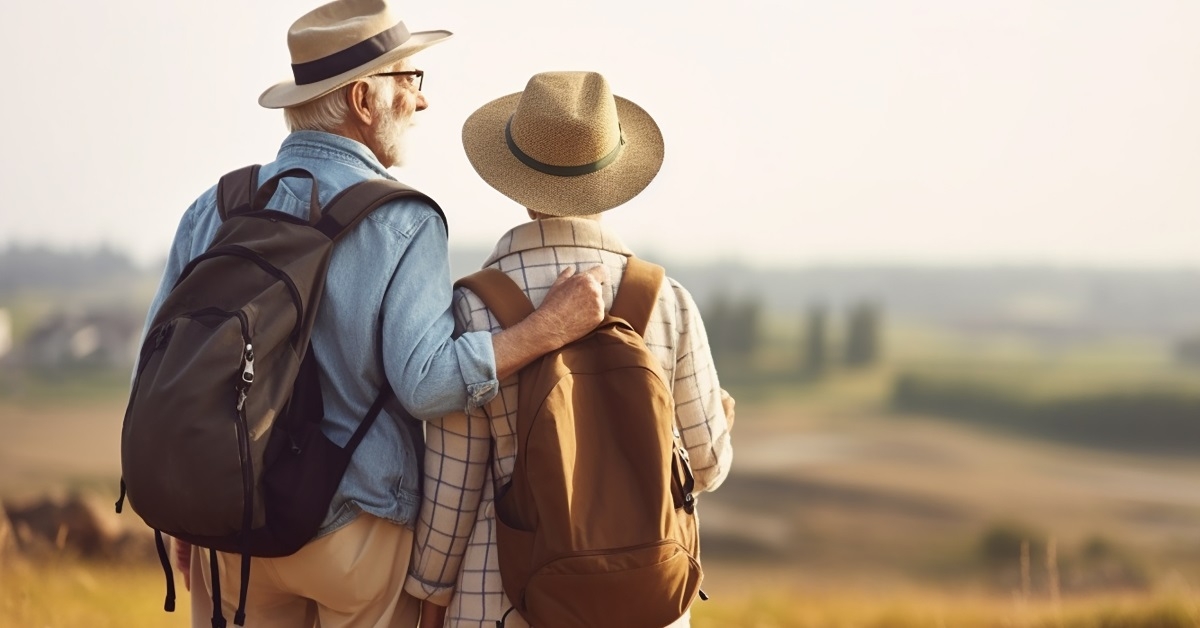 Elderly couple hiking .